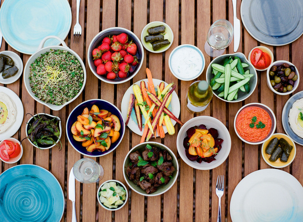 Outdoor food feast with wine