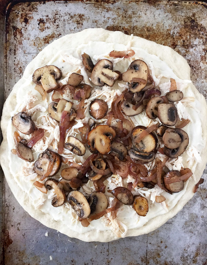 White chicken pizza before baking