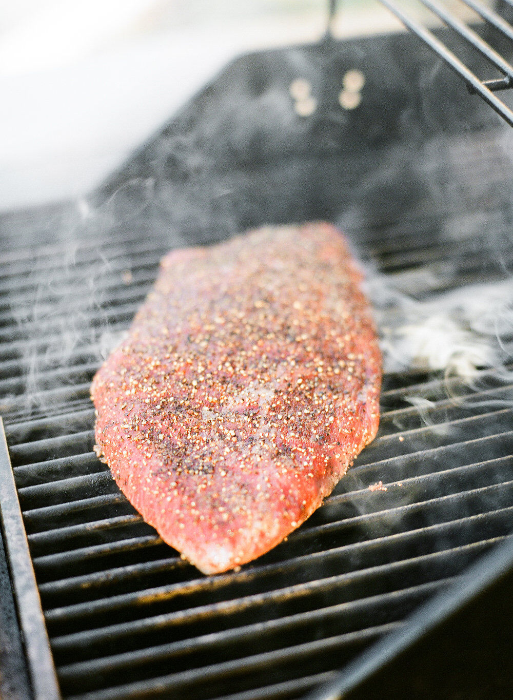 Flank steak on grill